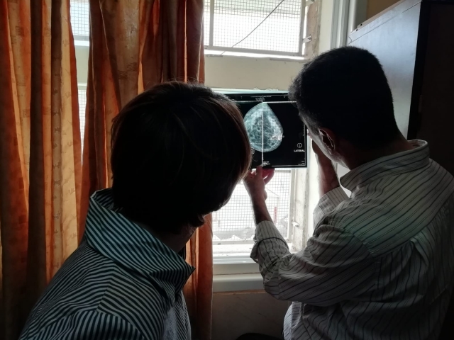 Reviewing breast imaging during an outpatient clinic at Rafidia Hospital