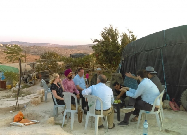 MPs talking with local residents in Susiya